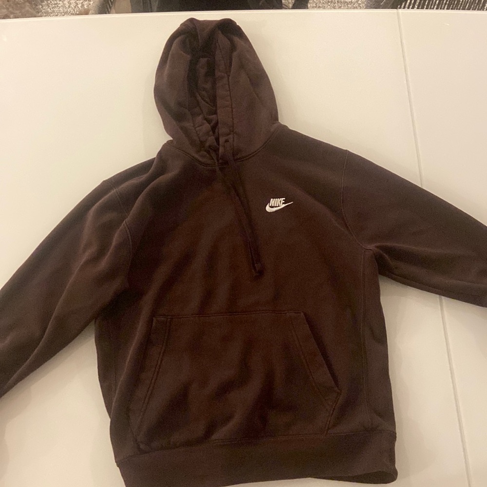 I am selling a brown Nike sweatshirt